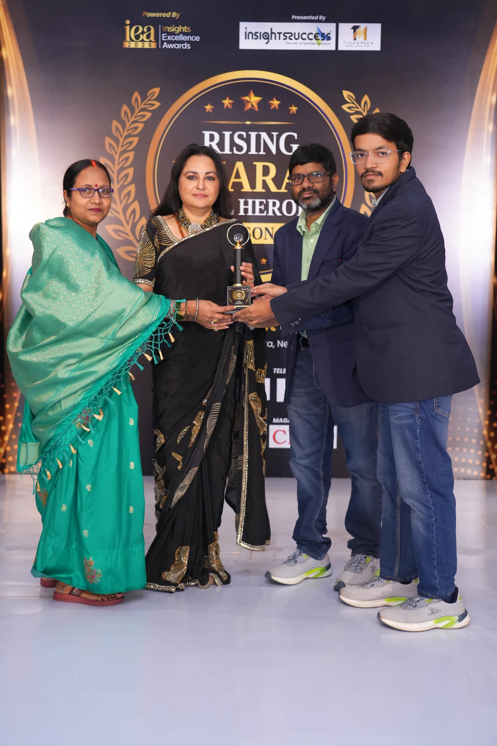 The Global Info Edge team receiving the Rising Bharat Real Heroes 2026 award on stage
